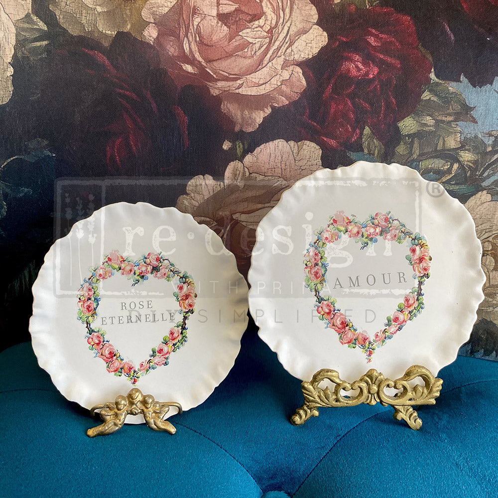 Two decorative plates with floral designs and text on a floral background