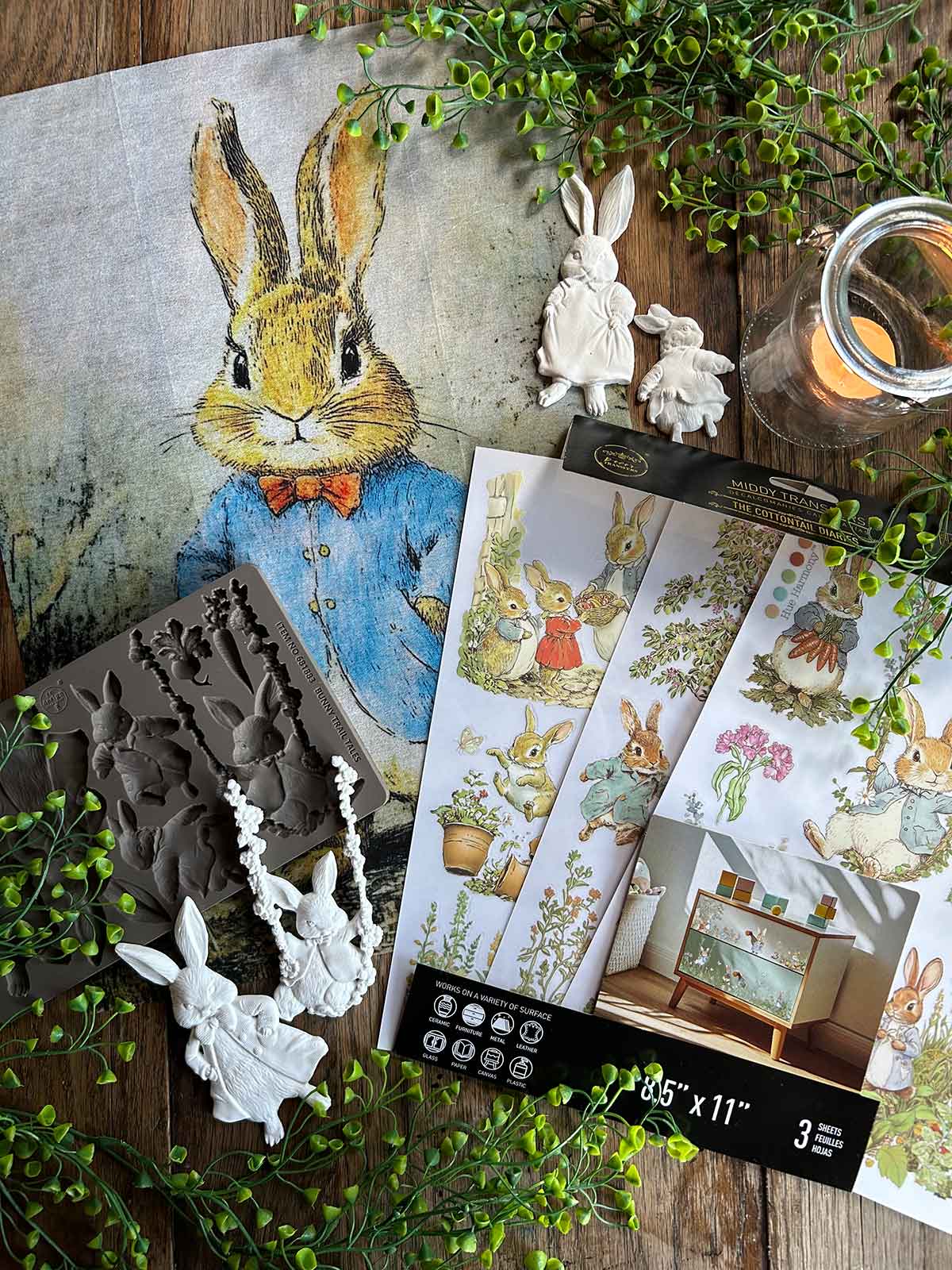 Crafting supplies with rabbit-themed items on a wooden surface