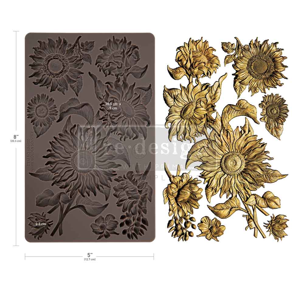 Decorative sunflower mold and gold sunflower embellishments on a white background