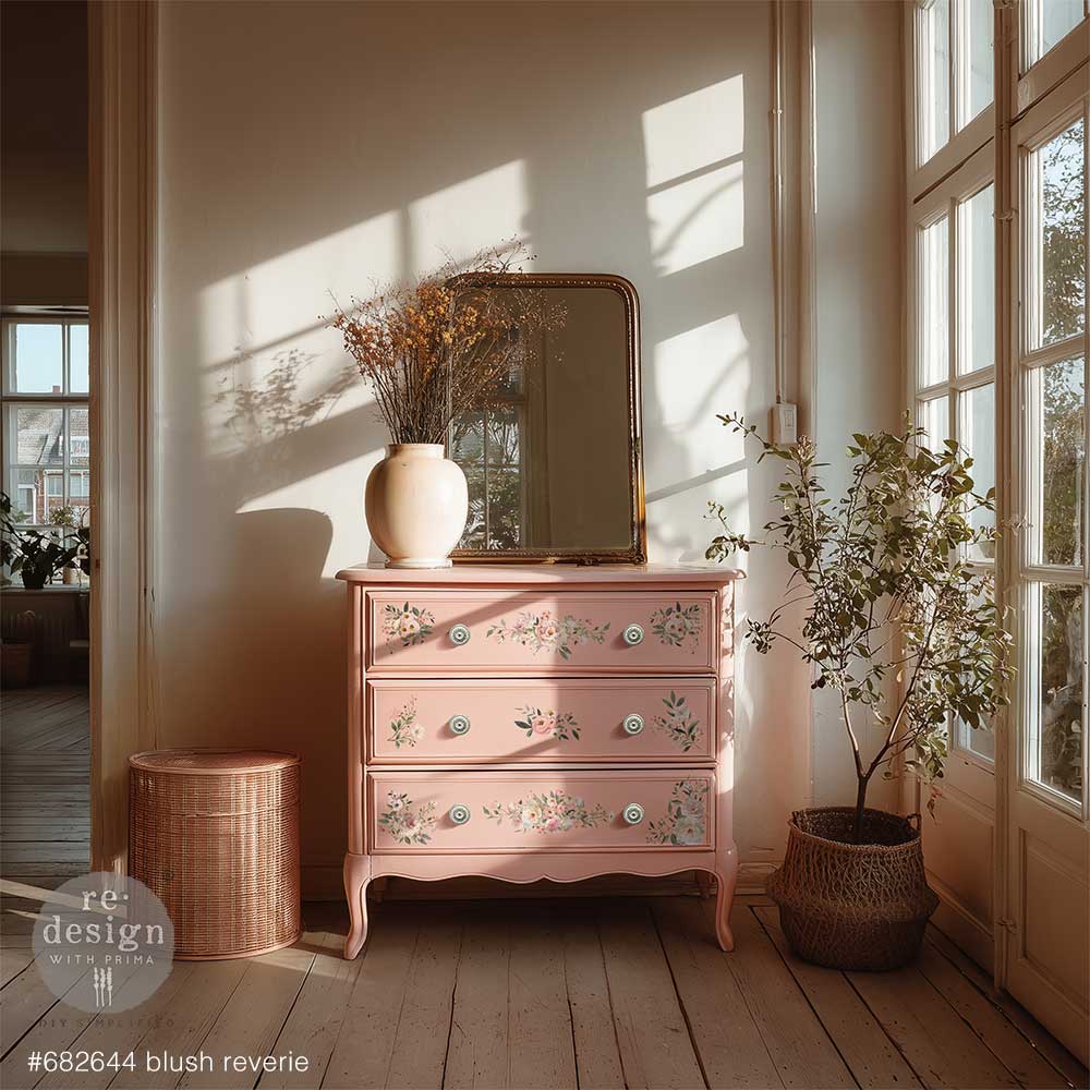 picture of pine 3 drawer dresser with pink floral transfer on the drawers