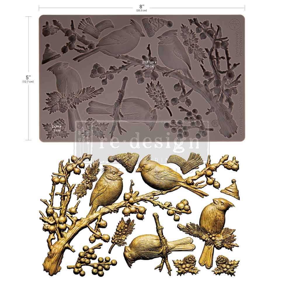 Silicone mold with bird and branch design and gold-colored birds on a white background