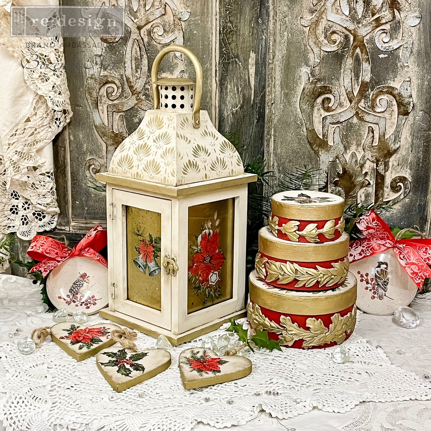 Decorative lantern, cake, and cookies on a lace tablecloth with a rustic background.