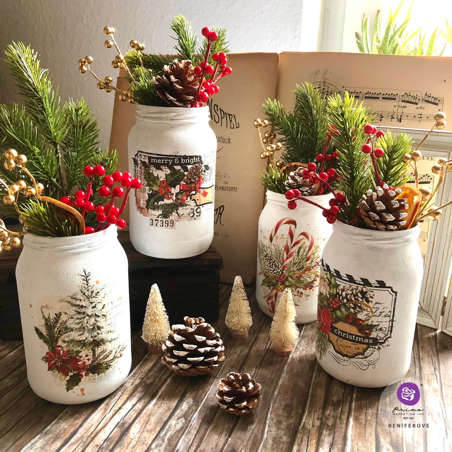Decorative jars with Christmas-themed designs and festive elements on a wooden surface.