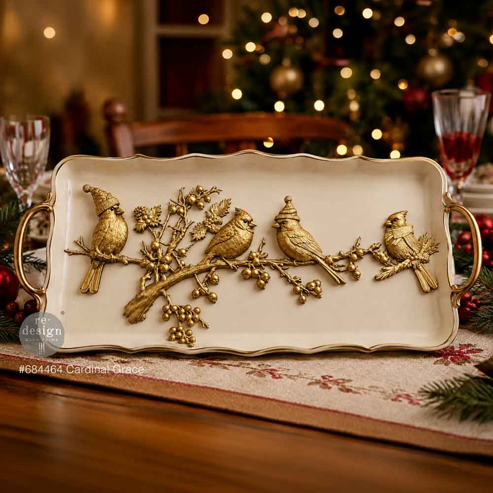 Decorative tray with bird design on a festive table setting
