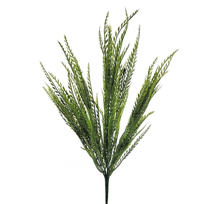 Artificial green plant branch on a white background