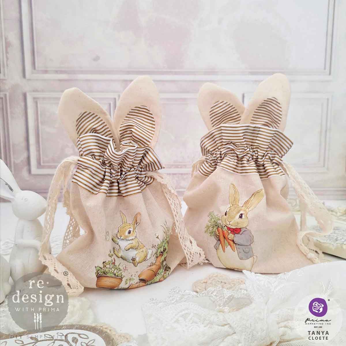 Two decorative bags with bunny designs on a light background