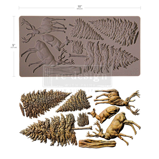 From tall pine trees to graceful deer, the Evergreen Christmas Magic Décor Mould® is filled with winter forest charm. Use these classic holiday elements to build woodland scenes, embellish frames and trays, or add natural elegance to your Christmas crafts. The textures and shapes make this mould a go-to for rustic, traditional, and enchanted winter projects alike.

Crafted from high-quality silicone, it’s food-safe and perfect for use with modeling materials, resin, wax, or even chocolate.
Only by Redesign 