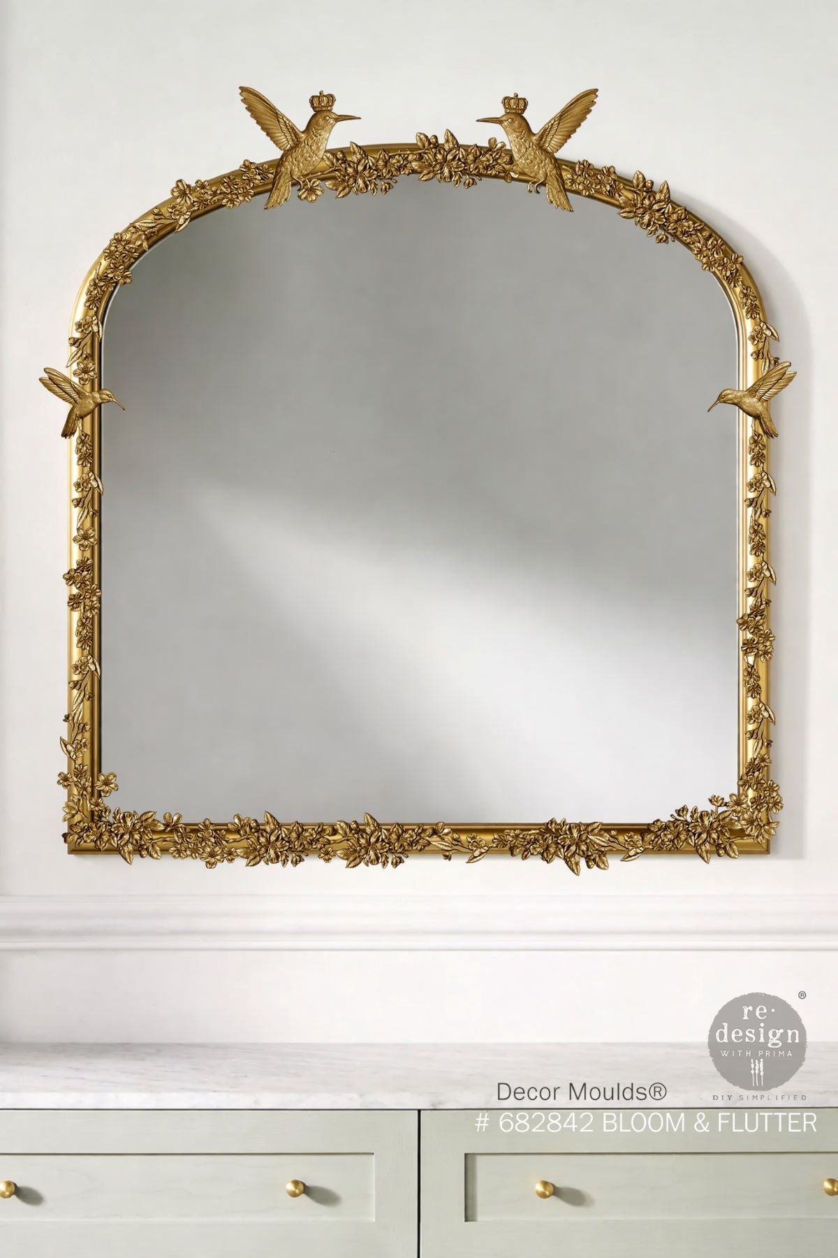 humming bird castings on a mirror border