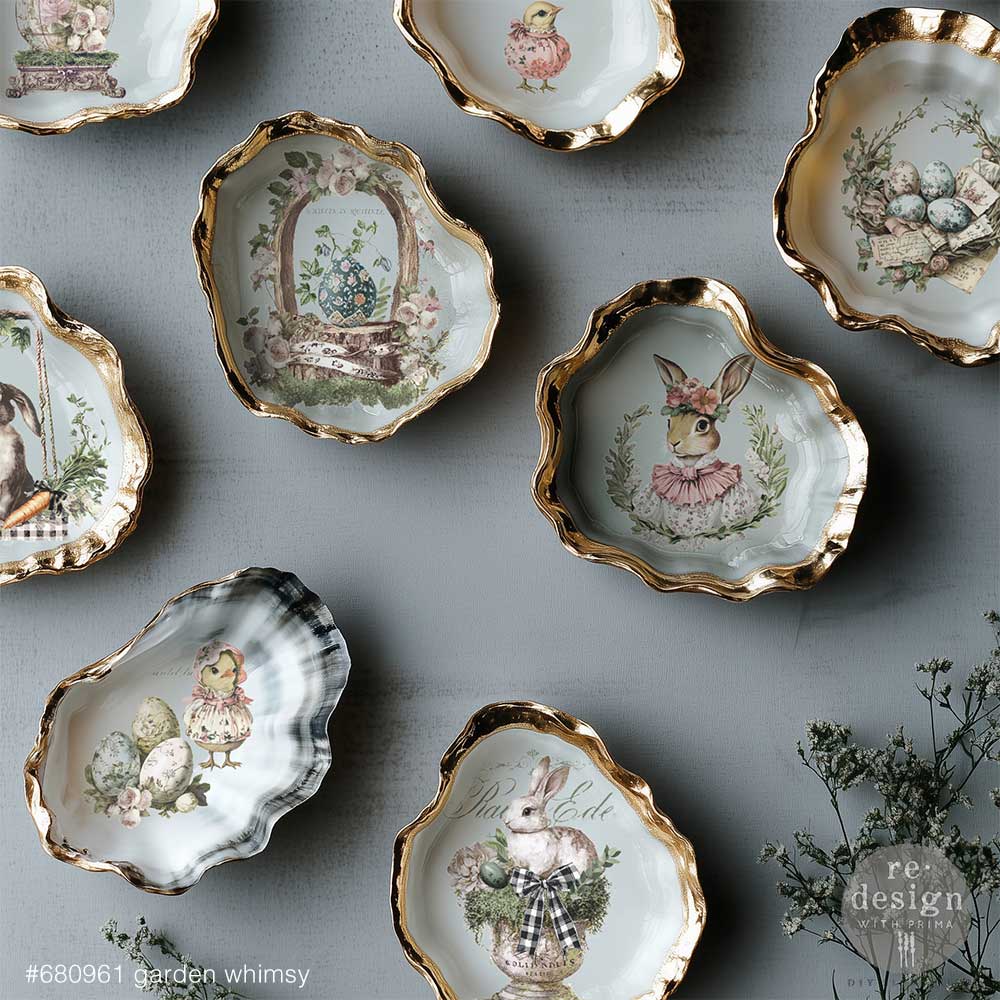 Decorative ceramic plates with rabbit designs on a gray surface