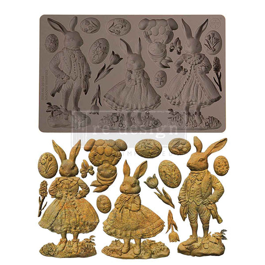 Decorative silicone mold with rabbit and flower designs on a white background