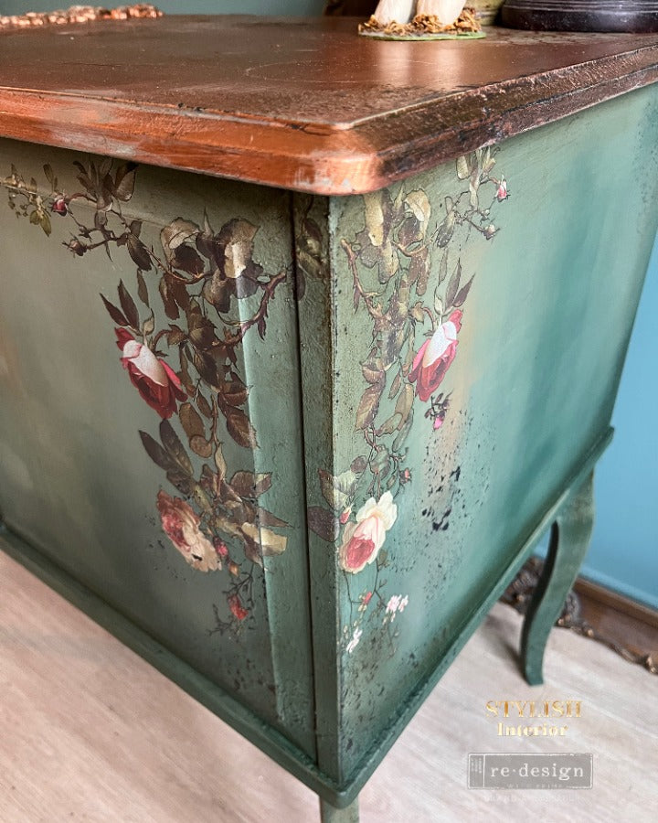 picture of a corner of a piece of furniture with the rose transfer 